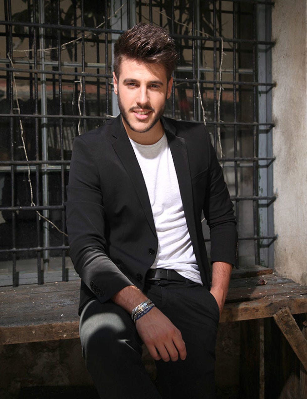 Human body, Dress shirt, Shirt, Outerwear, Collar, Coat, Facial hair, Sitting, Blazer, Watch, 