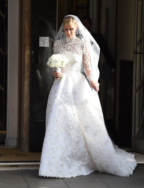 Clothing, Dress, Bridal clothing, Sleeve, Shoulder, Textile, Bridal veil, Wedding dress, Photograph, Veil, 
