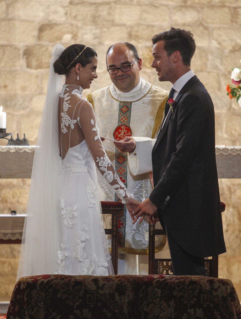 Bridal clothing, Dress, Suit, Formal wear, Bridal veil, Veil, Gown, Tradition, Bride, Interaction, 