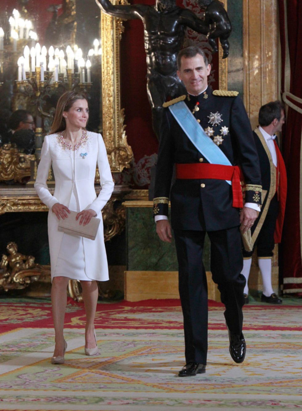 Formal wear, Fashion, Blazer, Tradition, Suit trousers, Curtain, Carpet, Monarch, Silk, Costume accessory, 