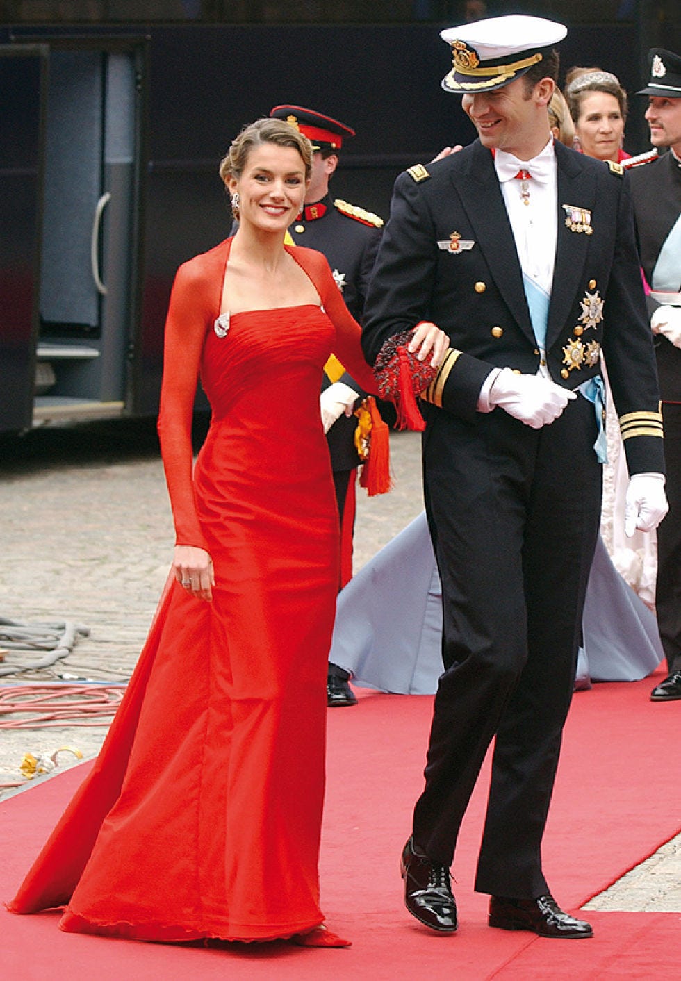 Trousers, Coat, Shoe, Hat, Flooring, Dress, Red, Outerwear, Formal wear, Carpet, 