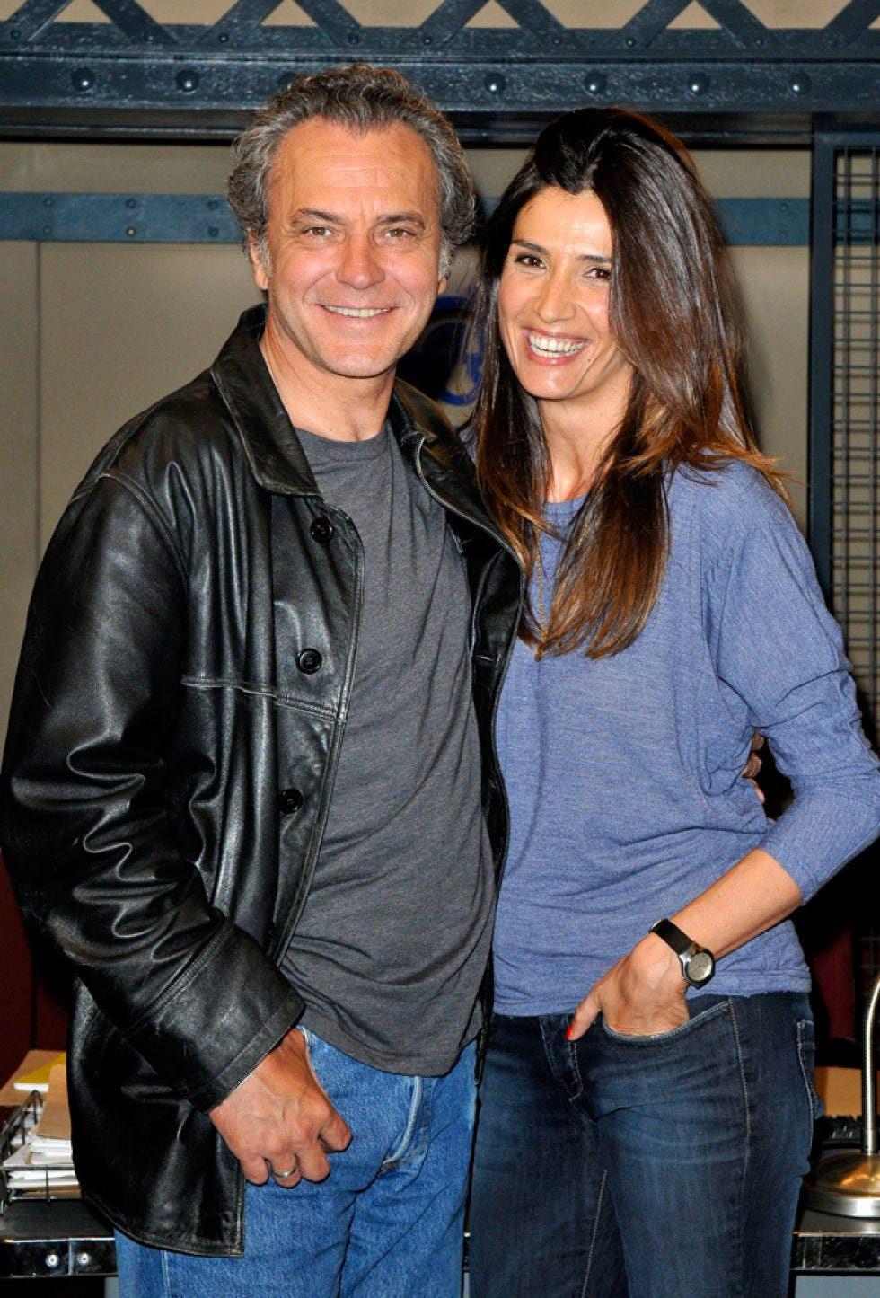 Smile, Jacket, Denim, Jeans, Textile, Outerwear, Happy, Facial expression, Interaction, Leather jacket, 