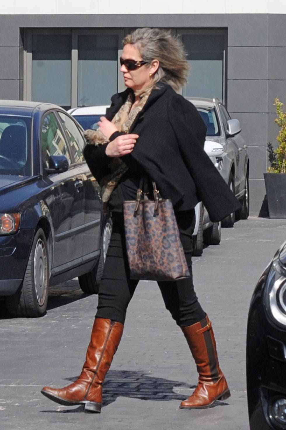 Clothing, Footwear, Brown, Textile, Sunglasses, Automotive parking light, Outerwear, Boot, Style, Street fashion, 