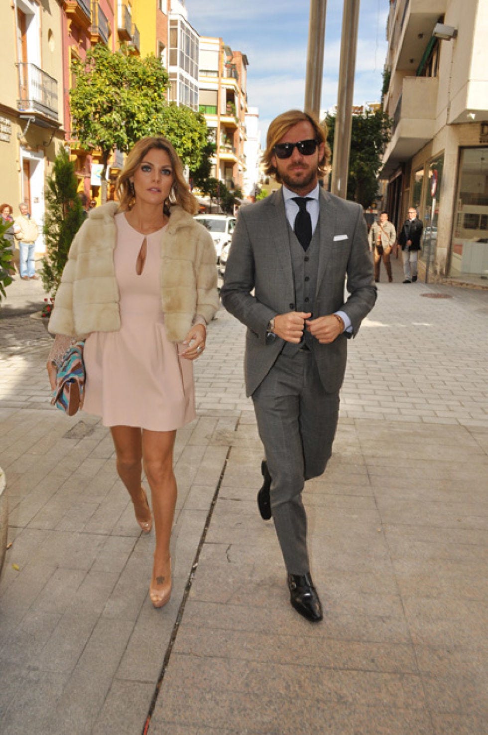 Clothing, Eyewear, Coat, Trousers, Human body, Collar, Shirt, Photograph, Standing, Outerwear, 