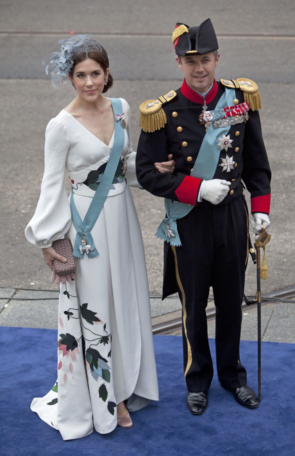 Hat, Coat, Flooring, Dress, Formal wear, Style, Headgear, Carpet, Fashion, Costume accessory, 