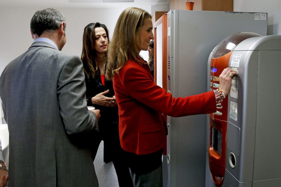 Standing, Machine, Major appliance, Refrigerator, Gas, Employment, Conversation, Job, Suit trousers, Business, 