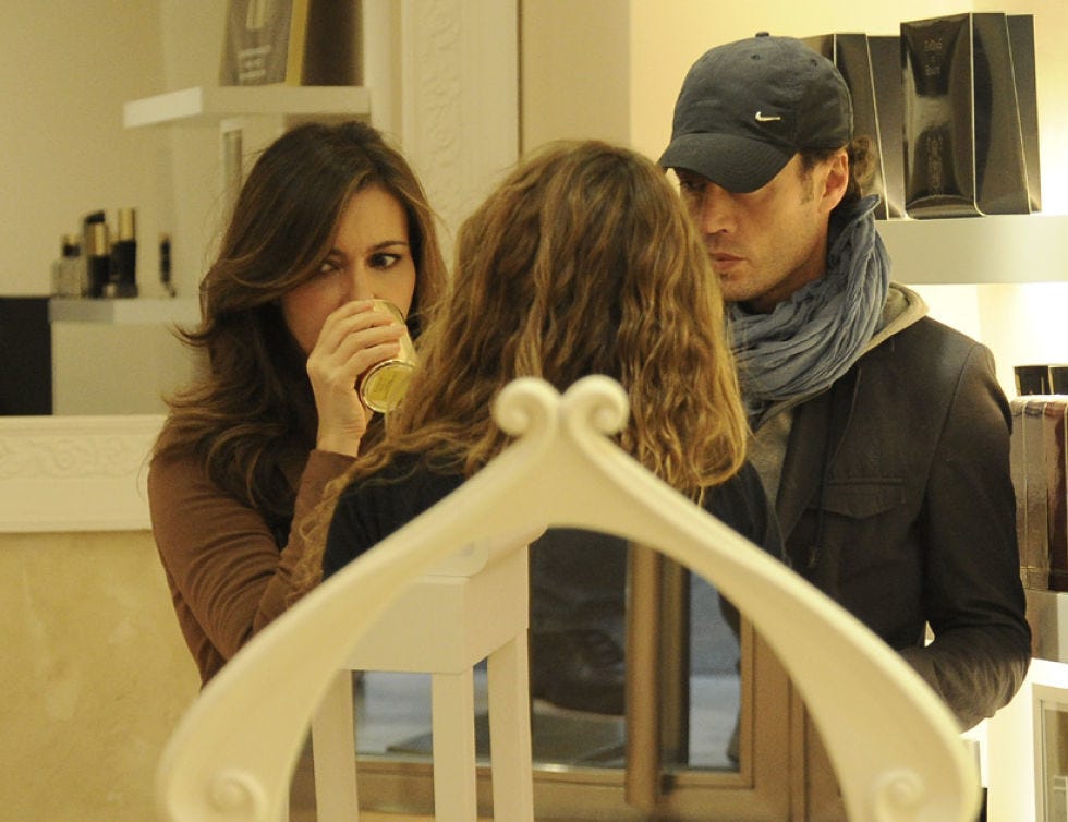 Cap, Interaction, Baseball cap, Picture frame, Conversation, Long hair, Facial hair, Beard, Brown hair, Love, 