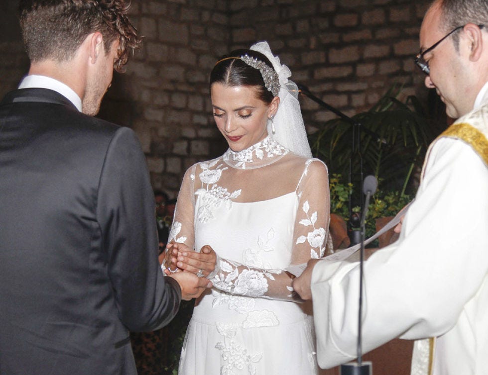 Clothing, Head, Ear, Dress, Bridal clothing, Coat, Textile, Bridal veil, Photograph, Outerwear, 