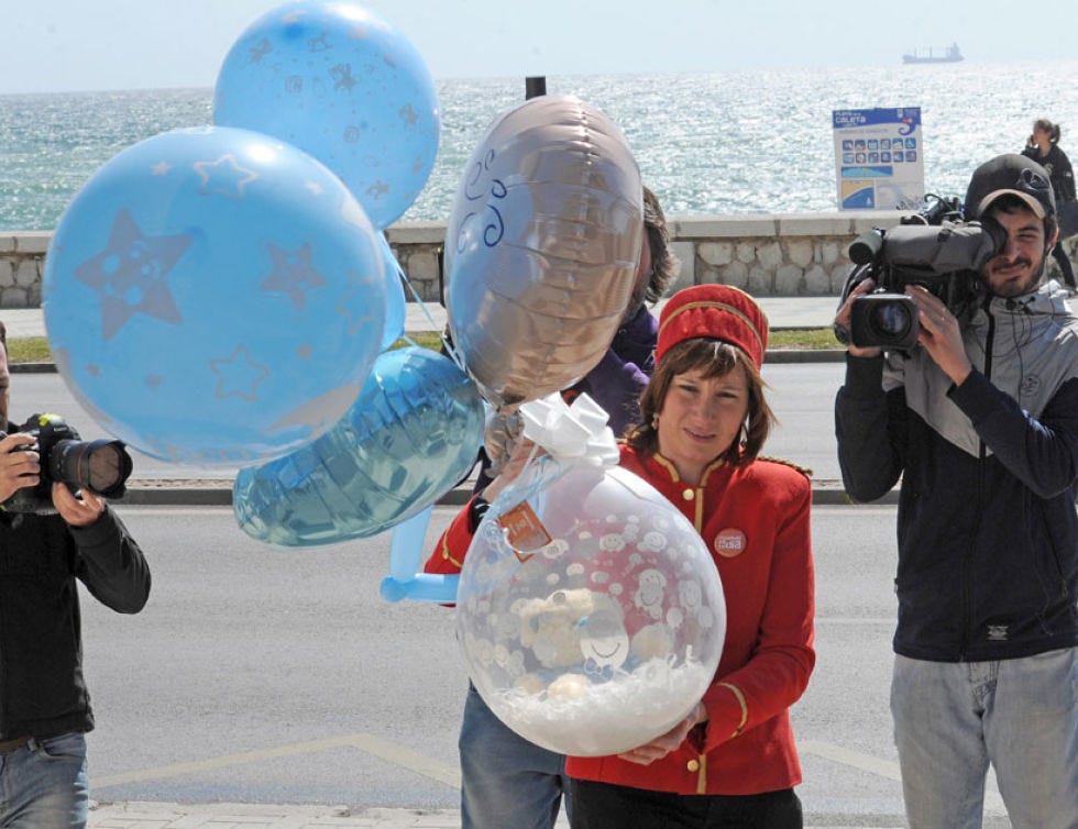Human, Camera, Photographer, Cameras & optics, Video camera, Camera operator, Balloon, Digital camera, World, Party supply, 