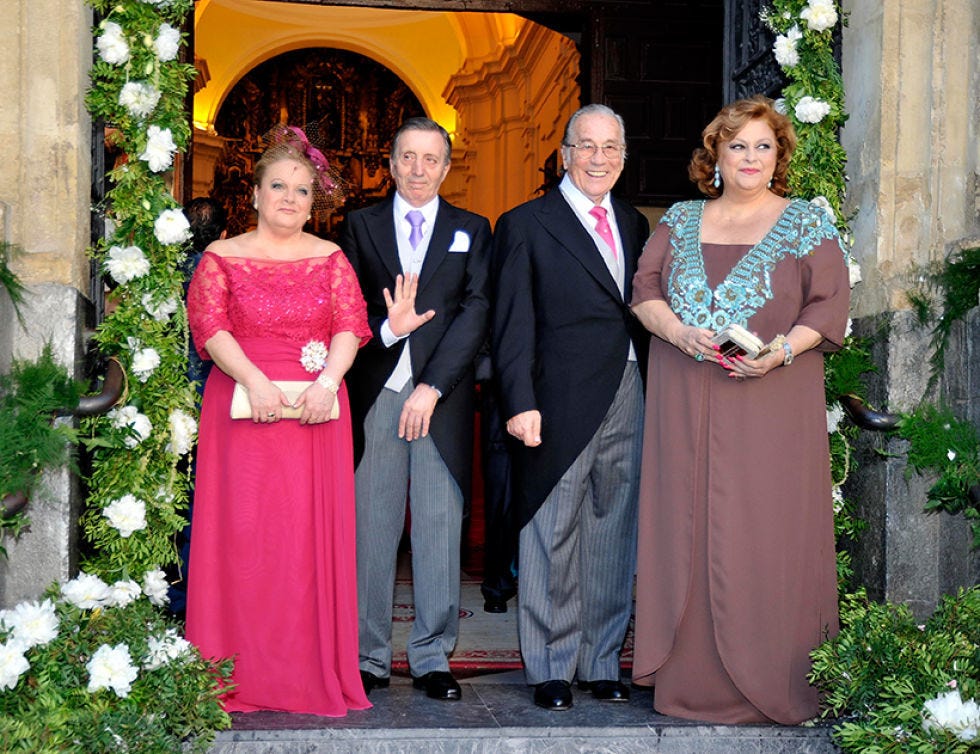 Clothing, Coat, Dress, Trousers, Event, Shirt, Photograph, Suit, Outerwear, Formal wear, 