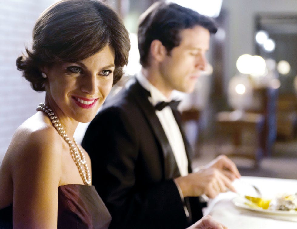 Ear, Coat, Dishware, Outerwear, Suit, Happy, Formal wear, Serveware, Jewellery, Cuisine, 