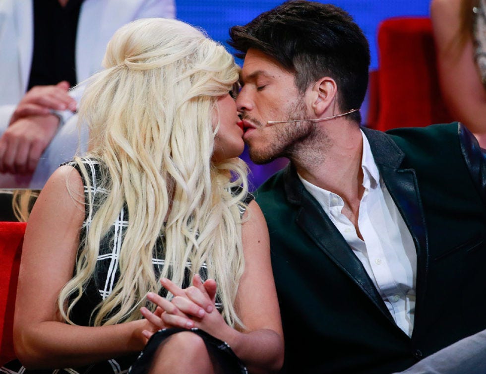 Ear, Interaction, Kiss, Romance, Beard, Love, Facial hair, Jewellery, Long hair, Gesture, 