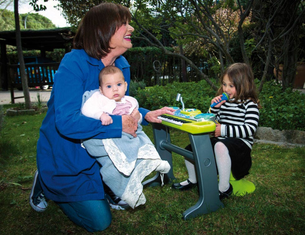 Child, Sitting, Sharing, Lap, Toddler, Outdoor furniture, Baby & toddler clothing, Garden, Baby, Yard, 