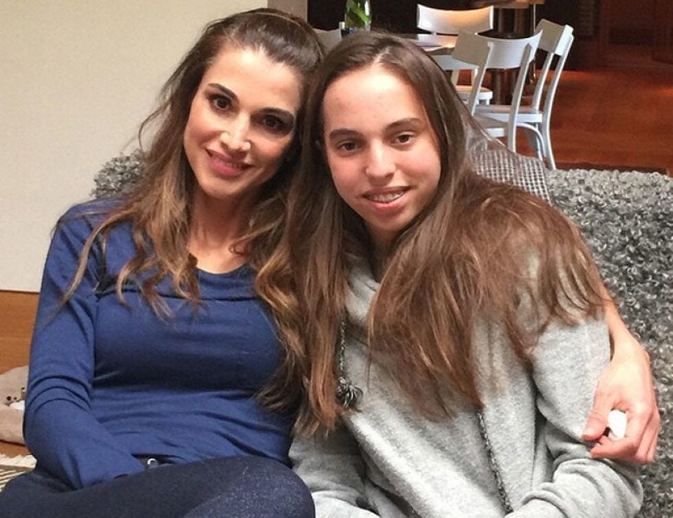 Smile, Comfort, Happy, Furniture, Sitting, Friendship, Long hair, Layered hair, Lap, Brown hair, 