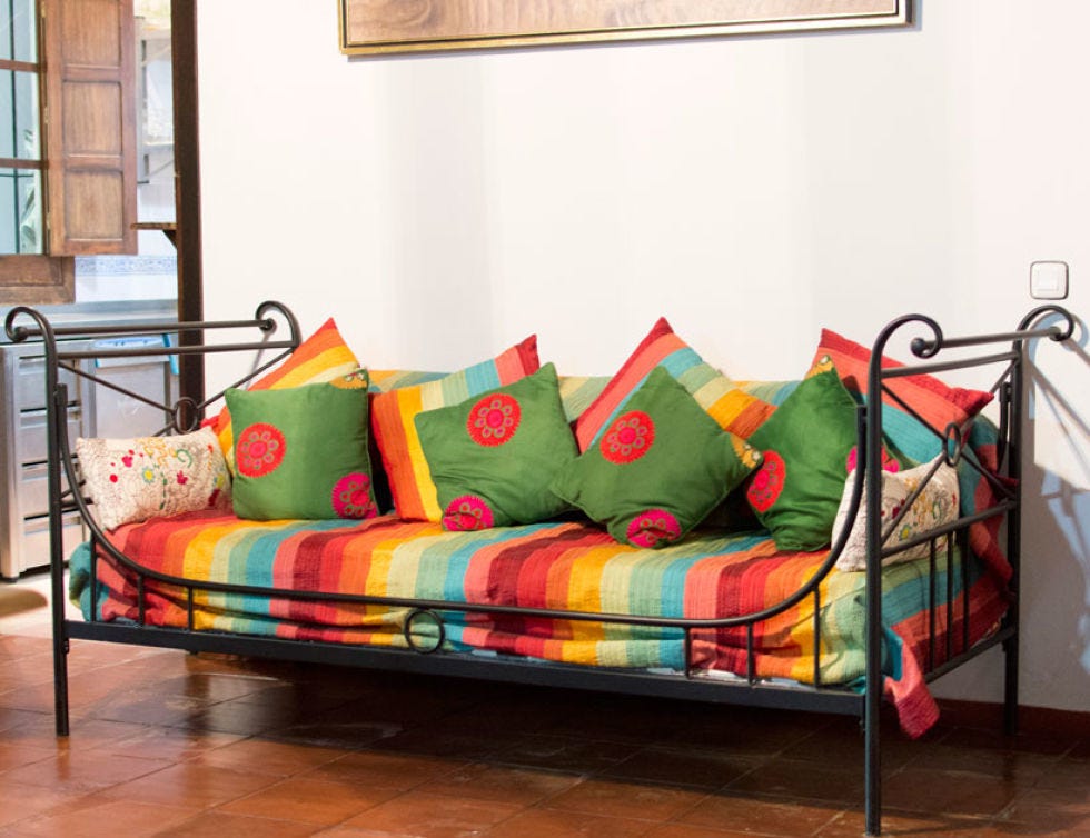 Room, Textile, Interior design, Wall, Home, Pillow, Cushion, Linens, Orange, Interior design, 