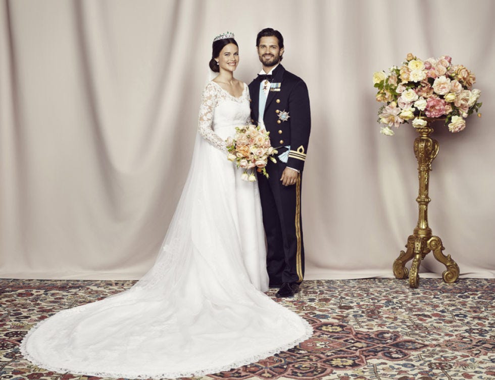 Clothing, Trousers, Bridal clothing, Dress, Photograph, Petal, Coat, Bouquet, Wedding dress, Gown, 