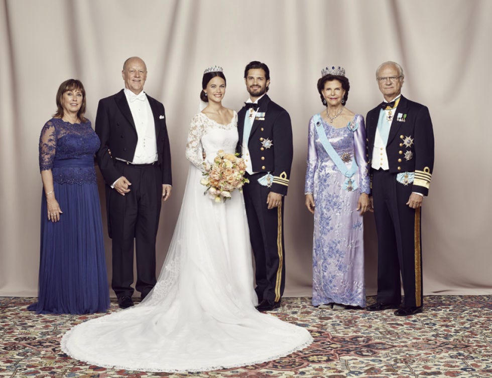 Bridal clothing, Coat, Sleeve, Trousers, Event, Dress, Textile, Photograph, Gown, Outerwear, 