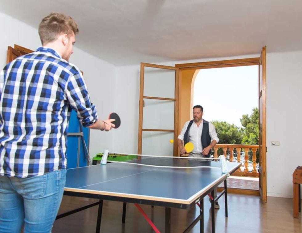 Blue, Ping pong, Racketlon, Sports equipment, Table, Denim, Standing, Jeans, Room, Community, 