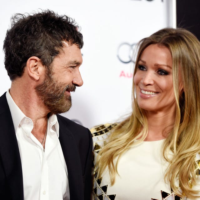 Clothing, Hair, Smile, Hairstyle, Coat, Collar, Outerwear, Facial hair, Beard, Facial expression, 