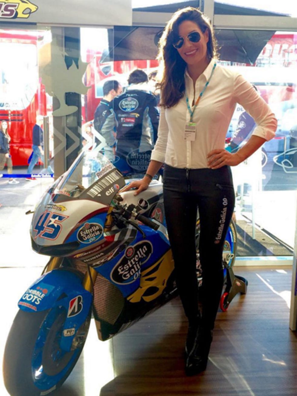 Eyewear, Automotive design, Sunglasses, Motorcycle, Fender, Logo, Bag, Jacket, High heels, Belt, 