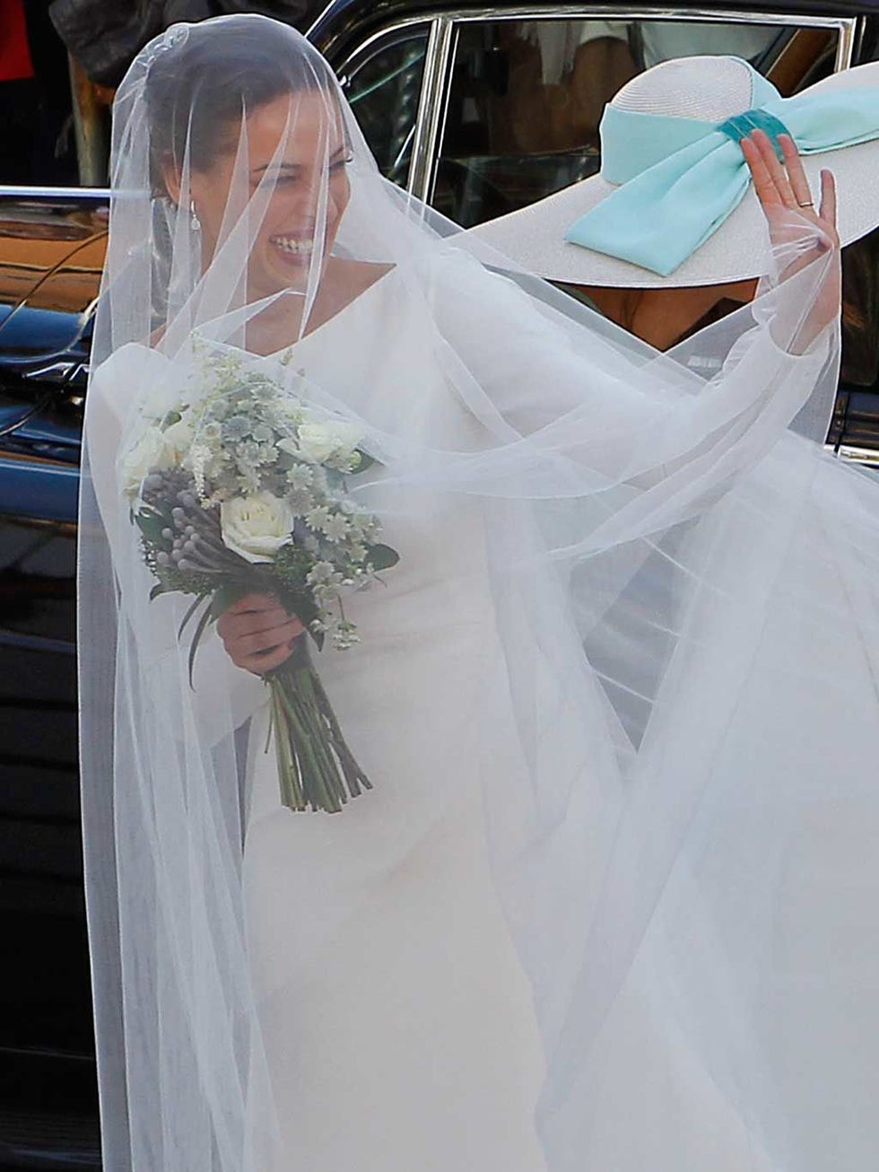 Bridal veil, Veil, Bridal clothing, Photograph, Wedding dress, Petal, Bride, Bridal accessory, Tradition, Ceremony, 