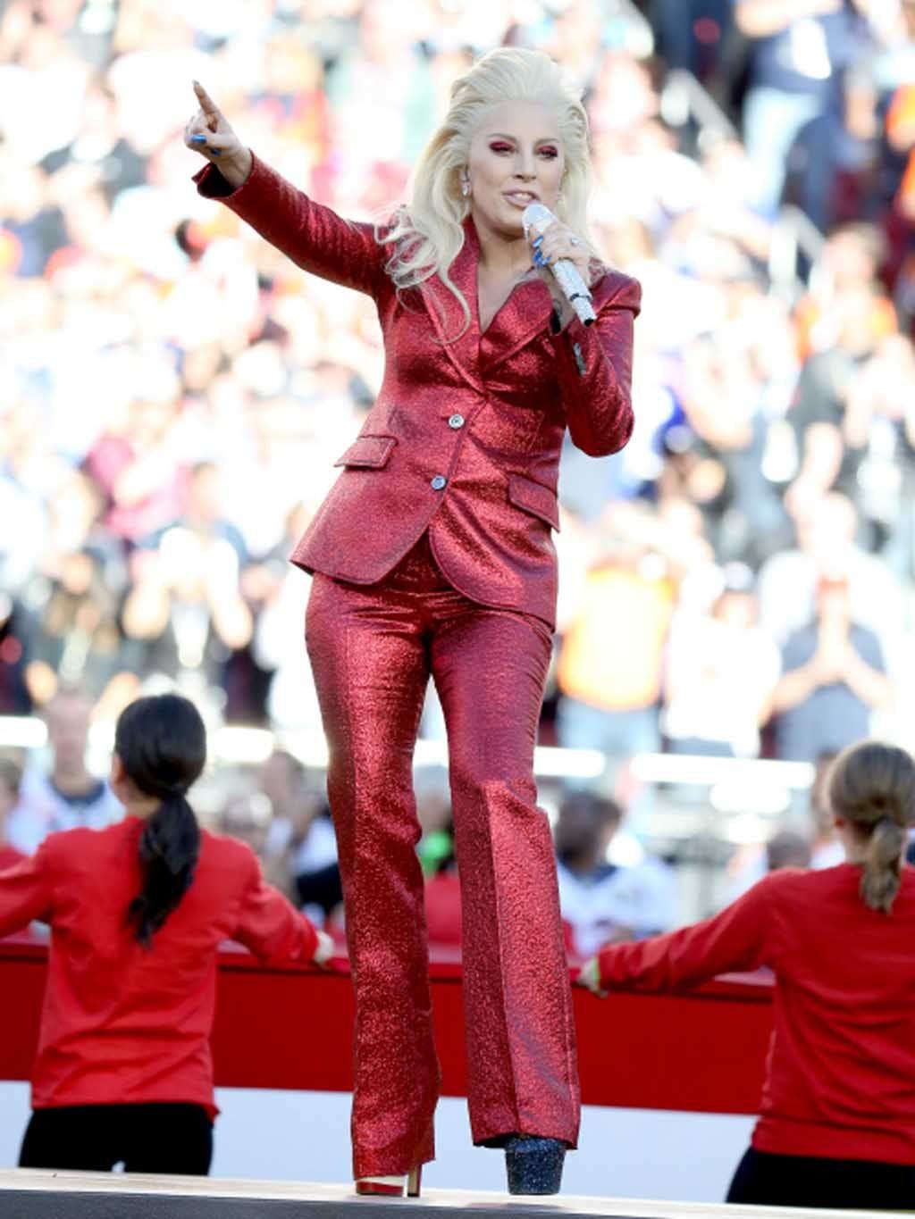 Human body, Red, Fashion, Carpet, Street fashion, Blond, Audience, Public event, Maroon, Blazer, 