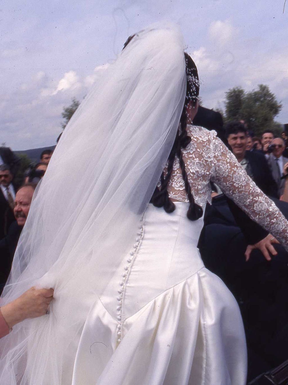 Bridal veil, Veil, Bridal clothing, Textile, Photograph, Wedding dress, Bride, Tradition, Dress, Bridal accessory, 