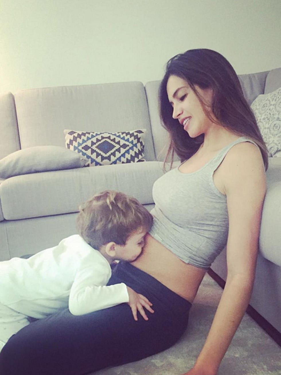 Human, Comfort, Human body, Shoulder, Elbow, Couch, Living room, Abdomen, Waist, Stomach, 