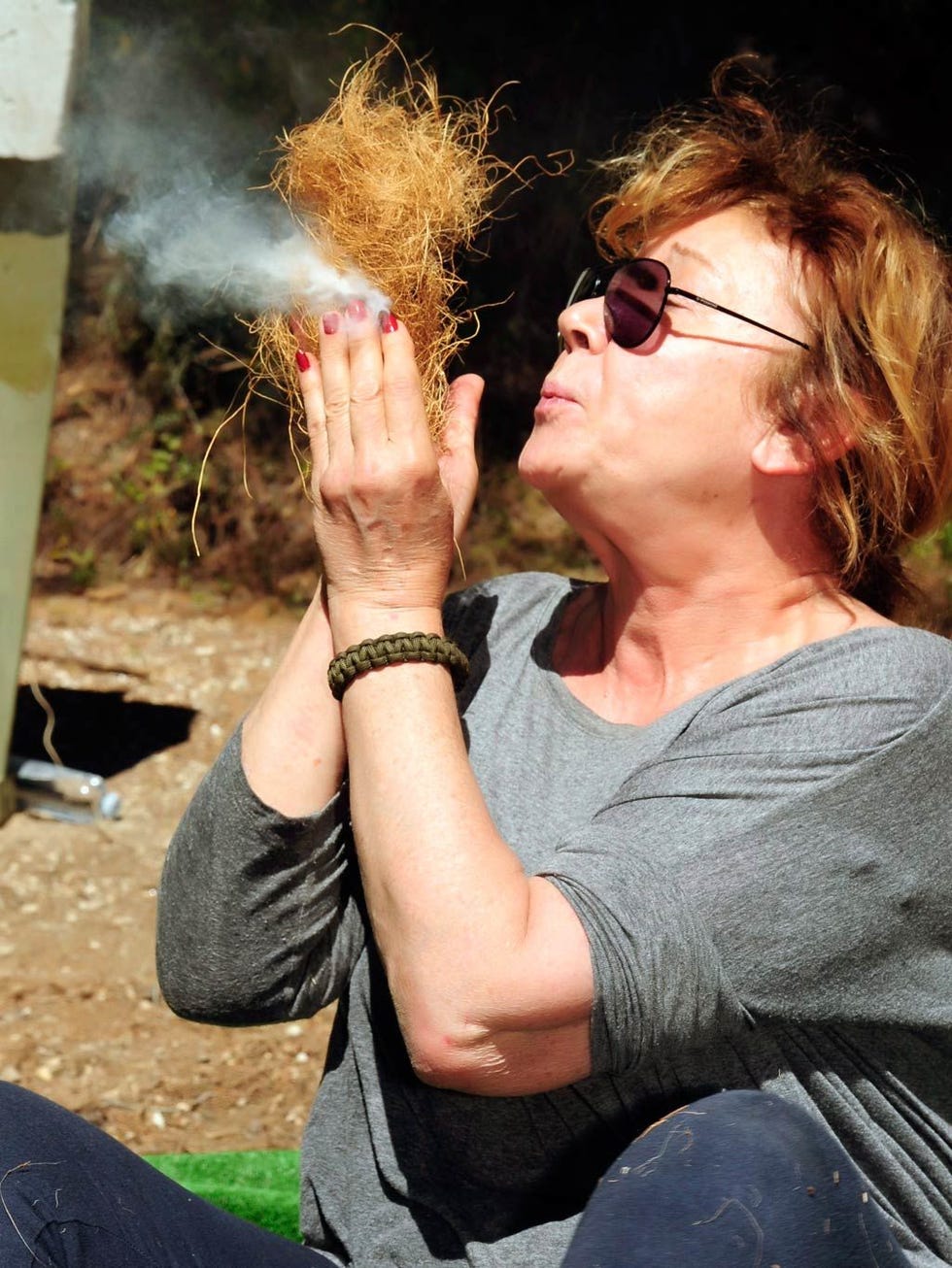 Eyewear, Vision care, Finger, Hand, Mammal, Wrist, Sunglasses, Sitting, Smoke, Jewellery, 