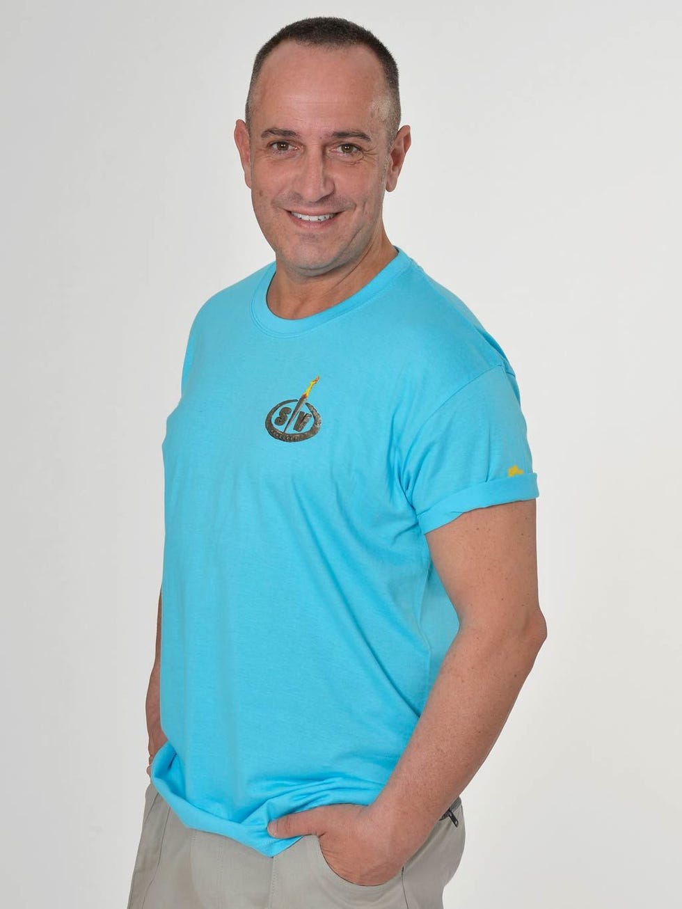 Blue, Sleeve, Shoulder, Elbow, Standing, Joint, T-shirt, Teal, Turquoise, Muscle, 