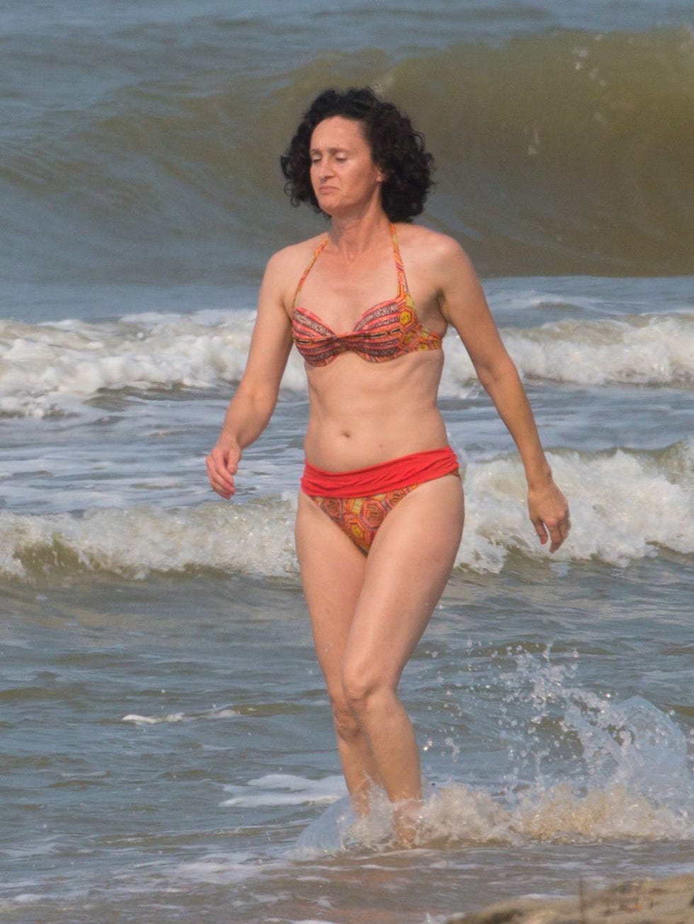 Clothing, Fun, Hairstyle, Brassiere, Swimwear, Photograph, Human leg, Swimsuit top, Bikini, Chest, 