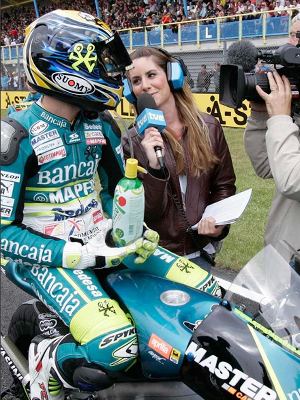 Camera, Digital camera, Video camera, Motorcycle helmet, Personal protective equipment, Logo, Helmet, Racing, Jersey, Championship, 