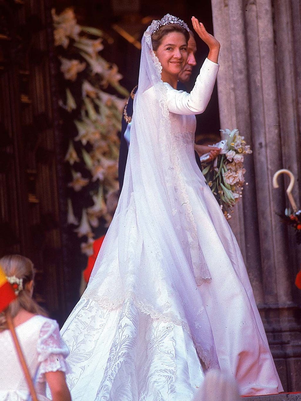 Dress, Pink, Bridal clothing, Headpiece, Gown, Wedding dress, Tradition, Hair accessory, Costume design, Bride, 