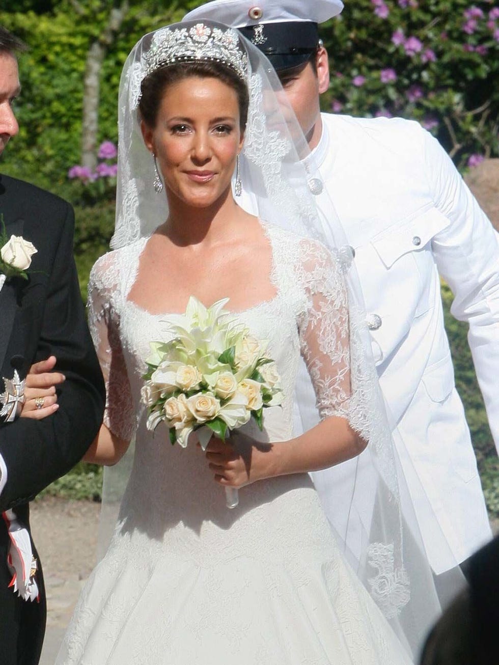 Clothing, Bridal clothing, Dress, Sleeve, Trousers, Petal, Bride, Wedding dress, Photograph, Outerwear, 