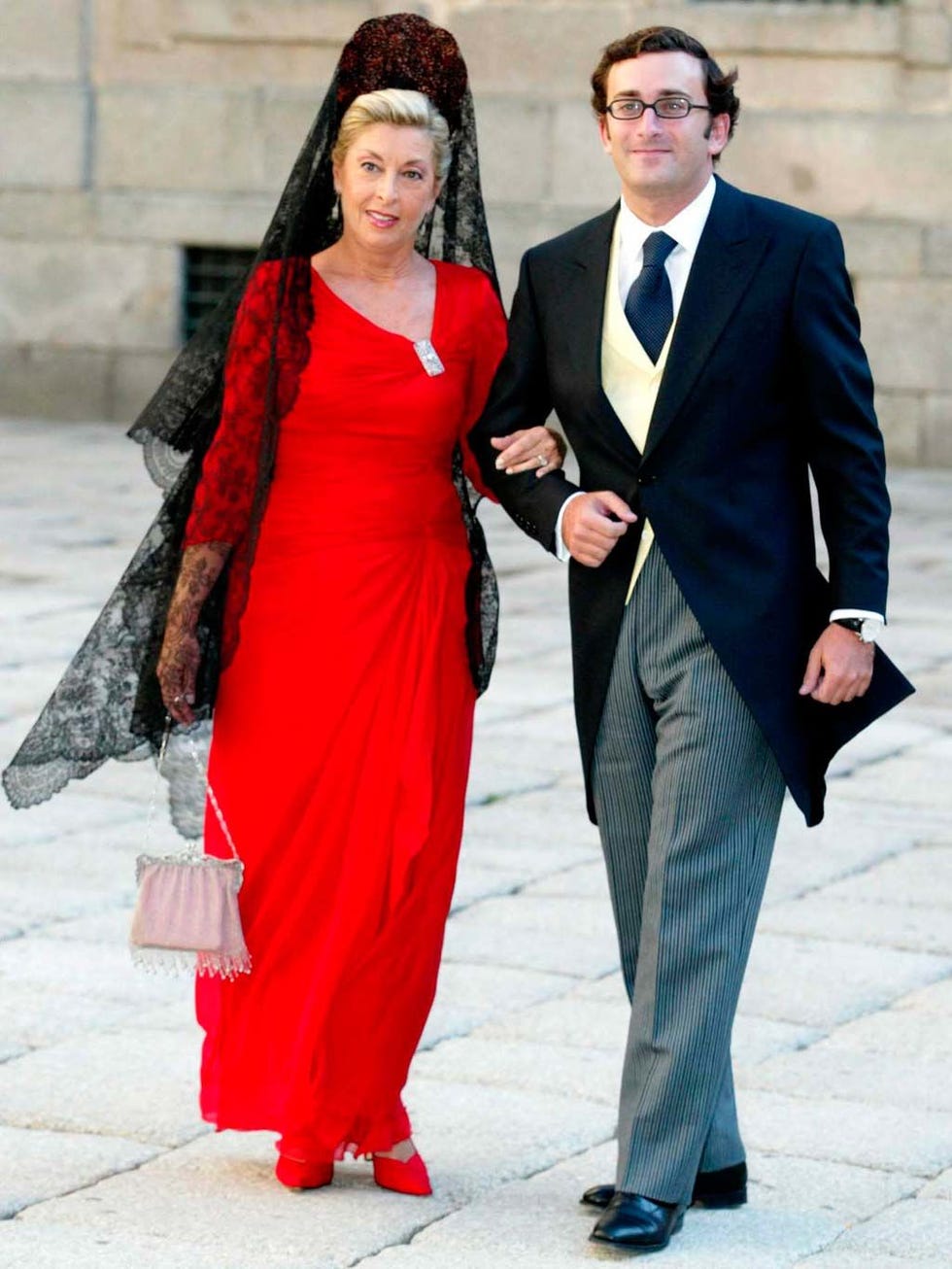 Clothing, Coat, Trousers, Shirt, Standing, Red, Outerwear, Formal wear, Suit trousers, Suit, 
