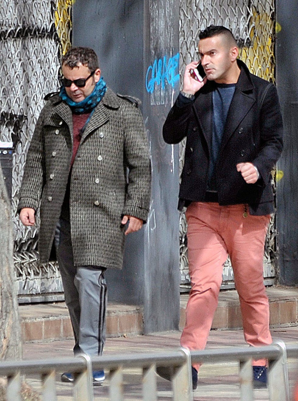Clothing, Coat, Trousers, Shirt, Standing, Collar, Outerwear, Dress shirt, Style, Sunglasses, 
