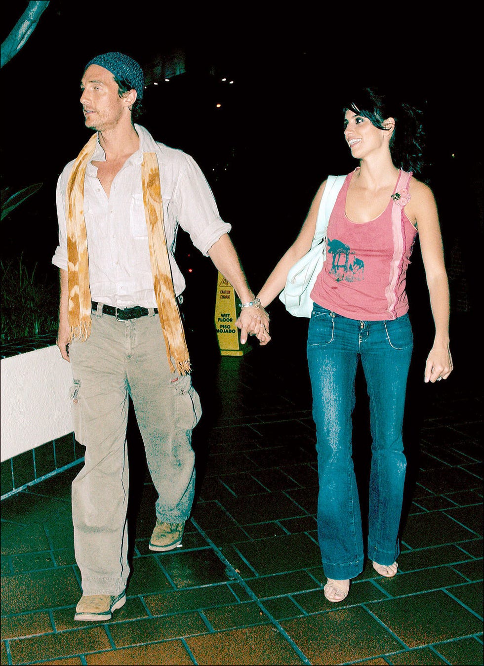 Green, Fun, Trousers, Denim, Social group, Textile, Standing, Jeans, Sleeveless shirt, Leisure, 