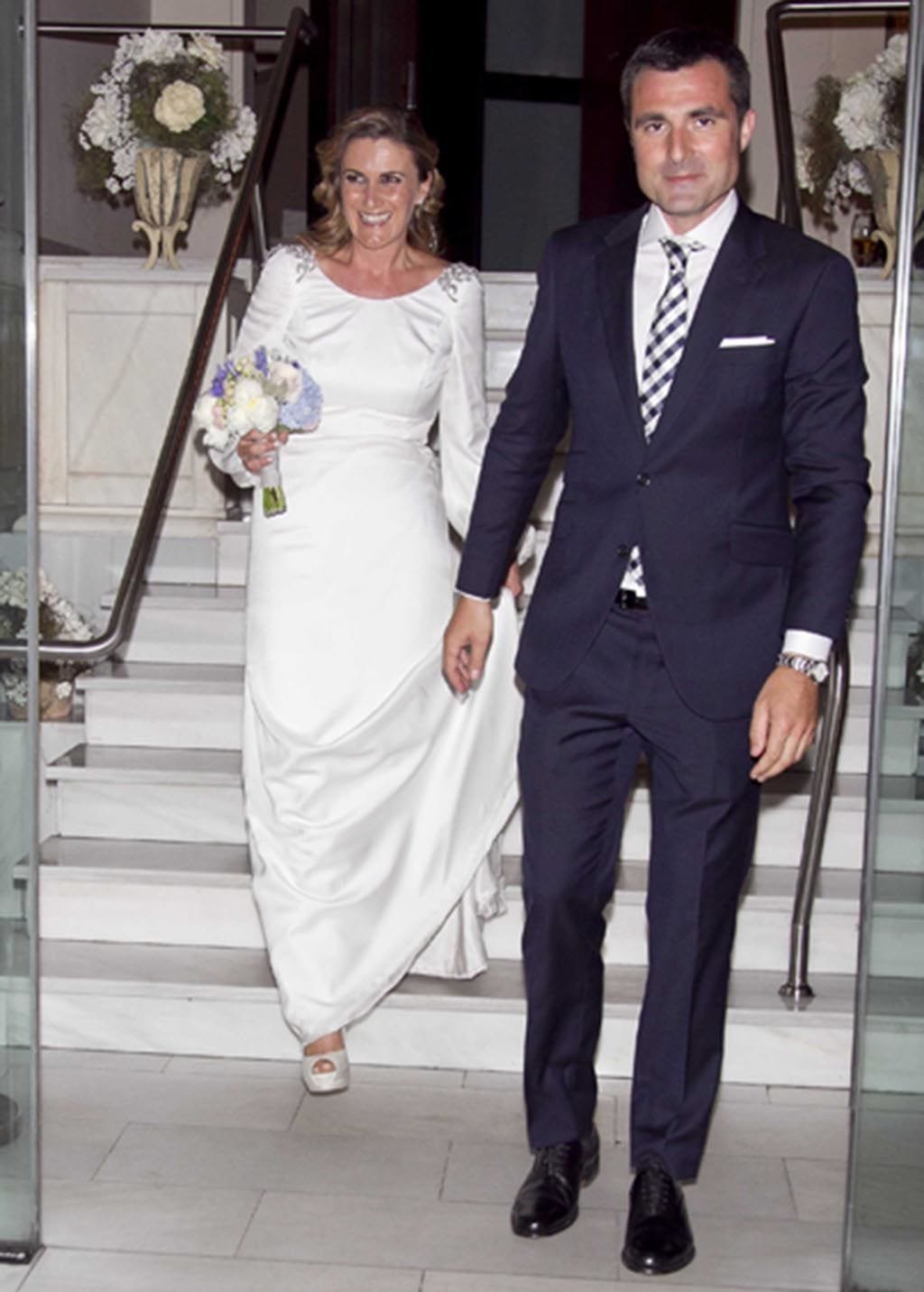 Clothing, Coat, Trousers, Dress, Suit trousers, Shirt, Bridal clothing, Photograph, Standing, Outerwear, 
