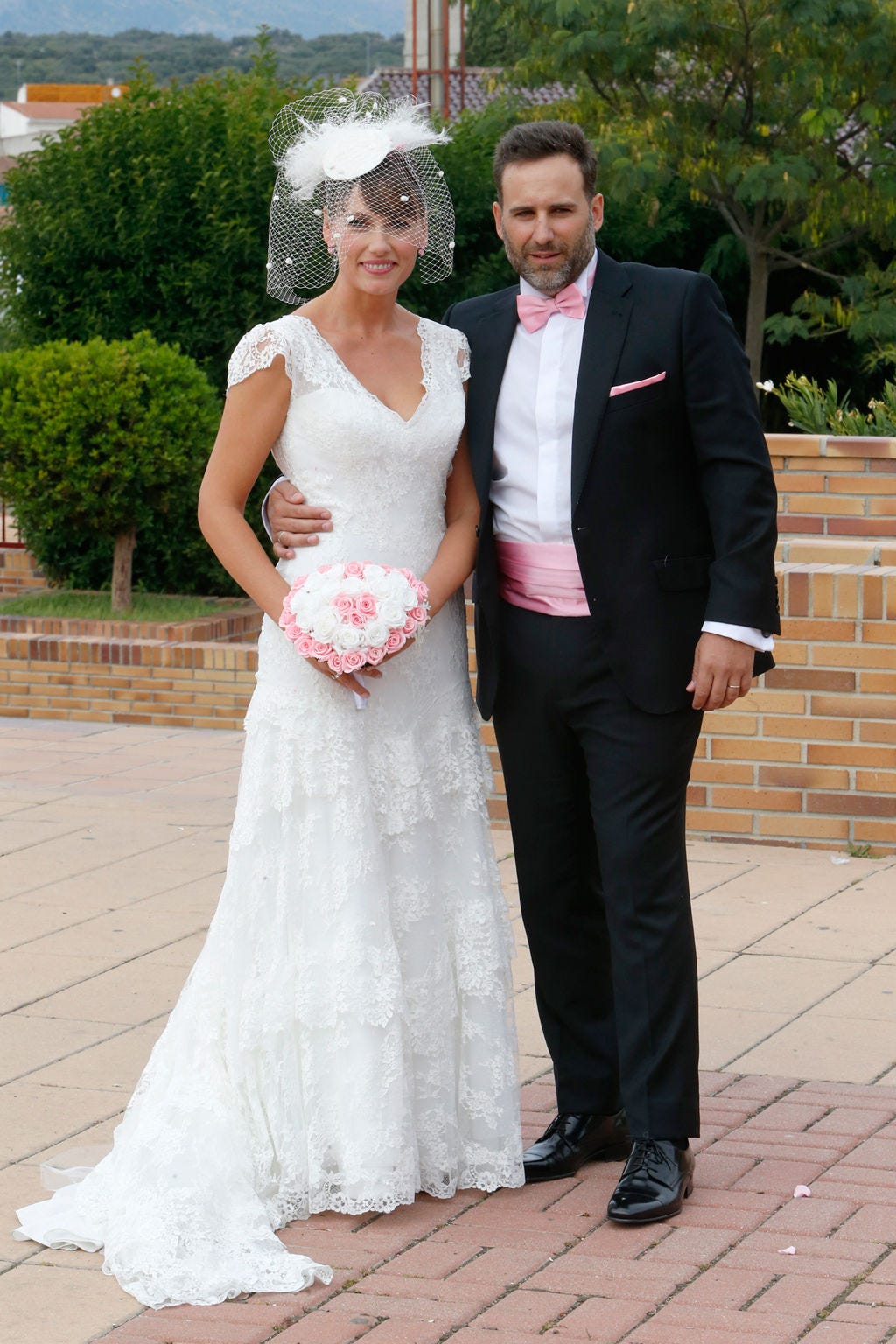 Clothing, Coat, Trousers, Dress, Bridal clothing, Textile, Photograph, Wedding dress, Outerwear, Standing, 
