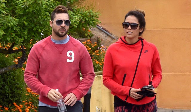 Eyewear, Vision care, Glasses, Sunglasses, Sleeve, Textile, Red, Outerwear, Sweater, Jacket, 