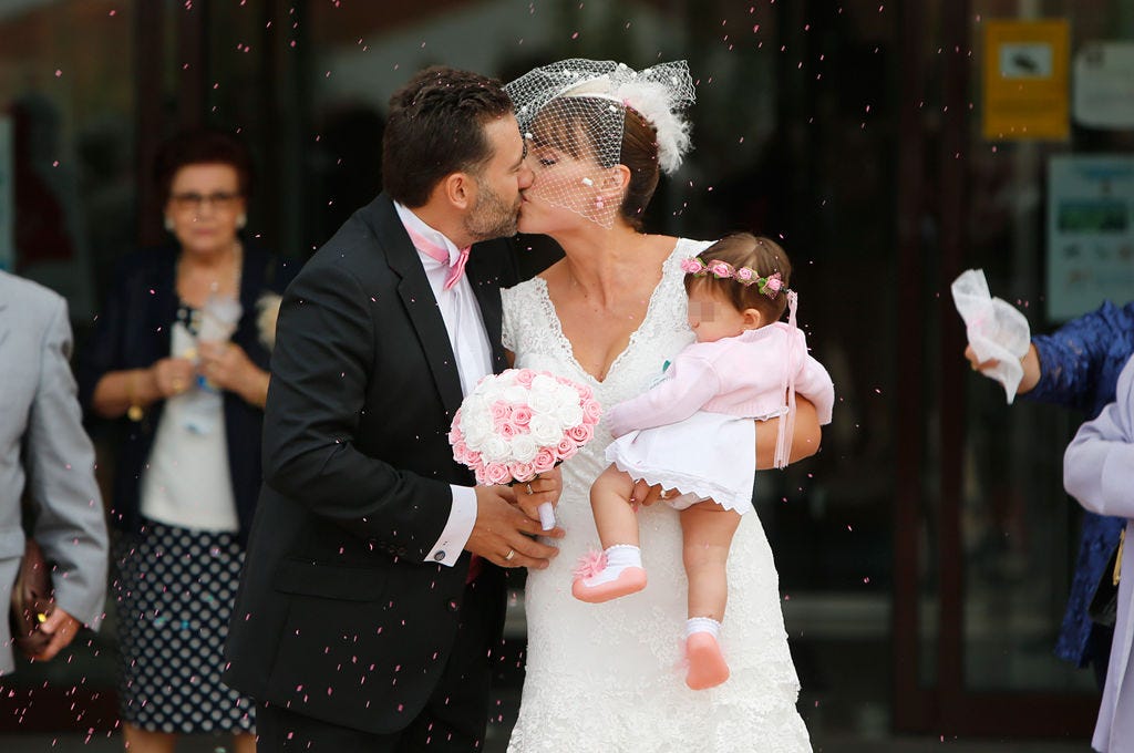 Coat, Trousers, Human body, Event, Outerwear, Happy, Suit, Dress, Kiss, Interaction, 
