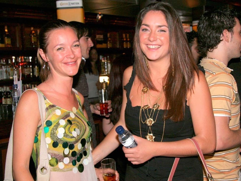 Smile, Alcoholic beverage, Alcohol, Drink, Barware, Distilled beverage, Dress, Liqueur, Shelf, Pub, 