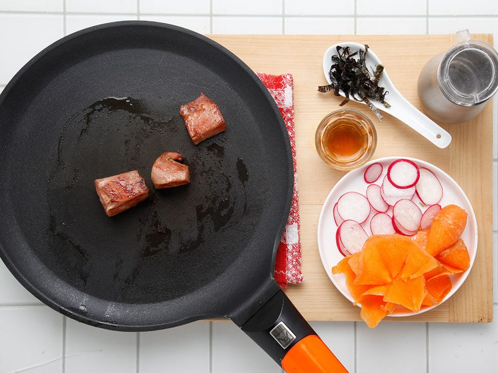 Food, Cookware and bakeware, Cuisine, Orange, Ingredient, Meal, Cooking, Frying pan, Kitchen utensil, Animal product, 
