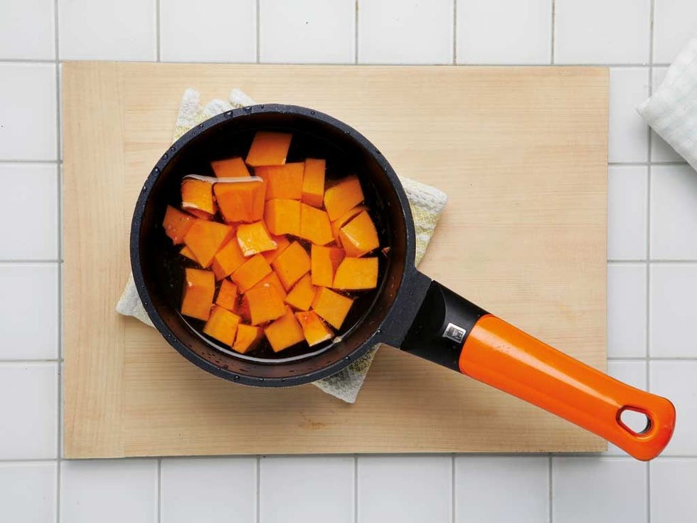 Orange, Amber, Ingredient, Tile, Root vegetable, Recipe, Stationery, Flame, Kitchen utensil, Tile flooring, 