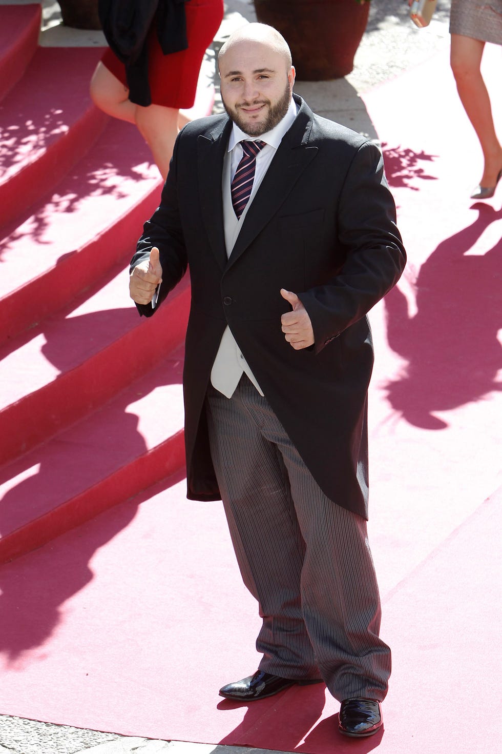 Clothing, Coat, Trousers, Shirt, Red, Collar, Suit, Outerwear, Suit trousers, Standing, 