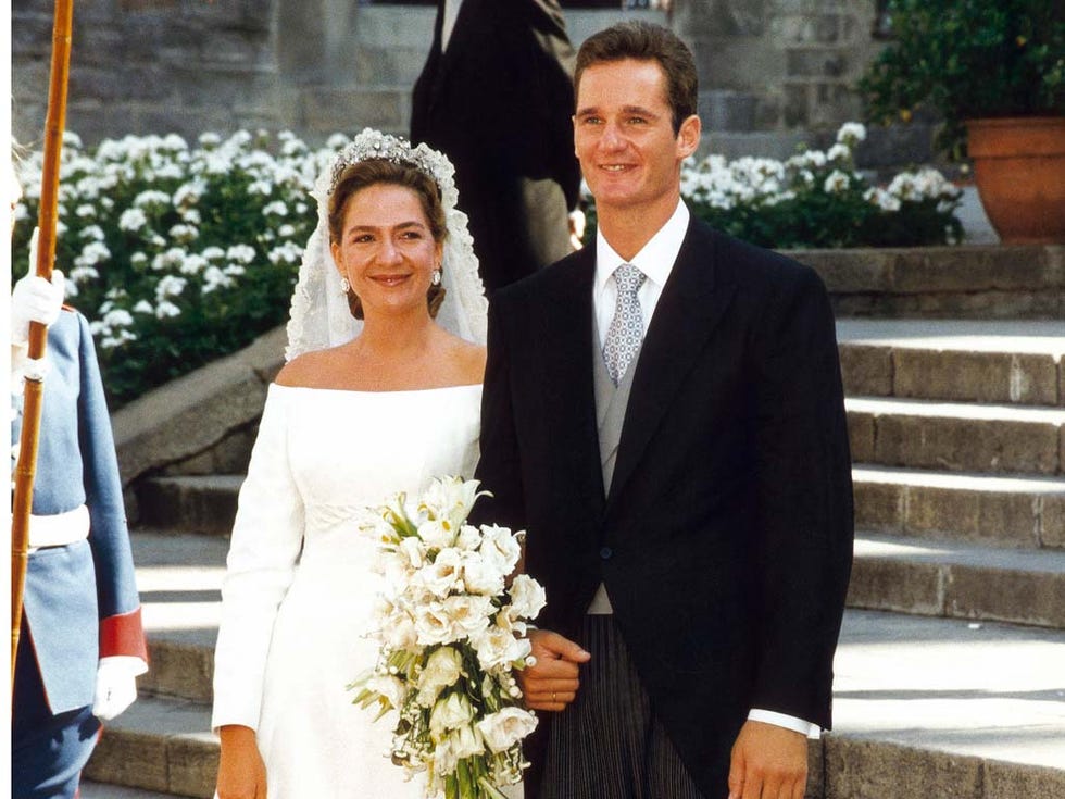 Clothing, Smile, Coat, Trousers, Bouquet, Bridal clothing, Dress, Petal, Shirt, Photograph, 
