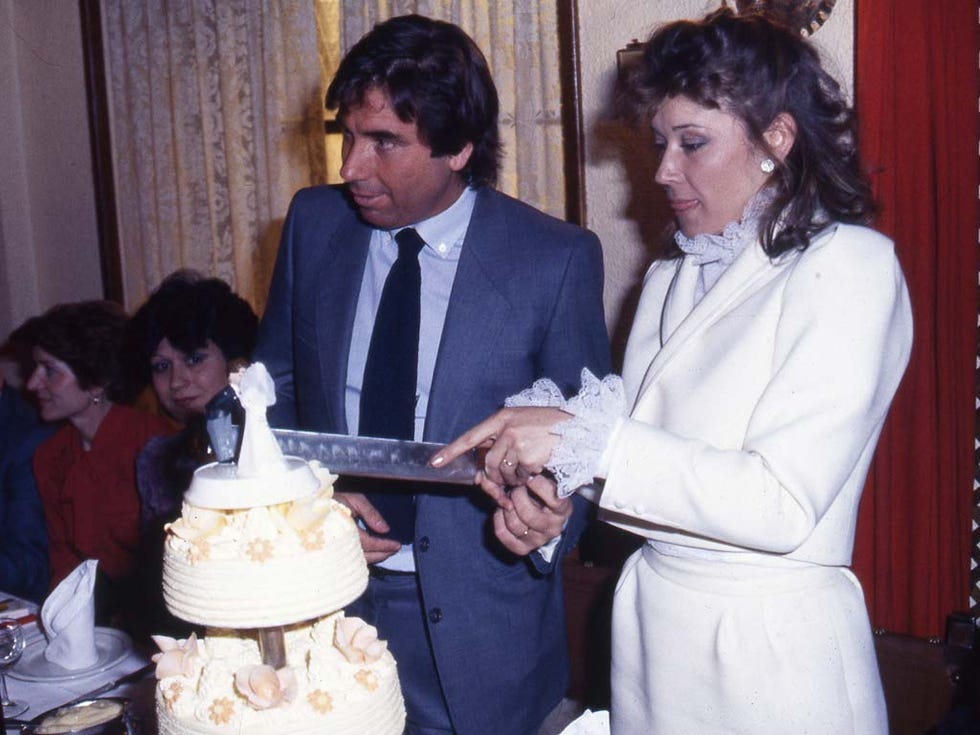 Cake, Cuisine, Food, Dessert, Baked goods, Ingredient, Sweetness, Cake decorating, Formal wear, Coat, 