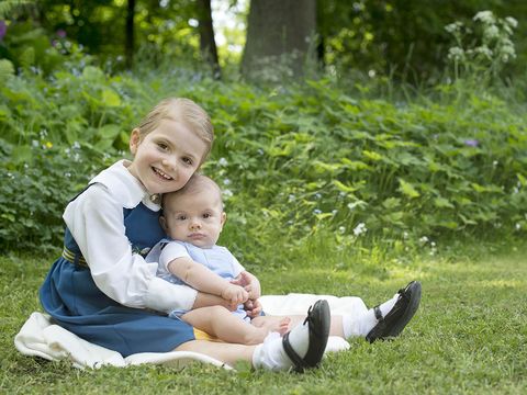 Human, Leg, Grass, Shoe, Child, Happy, People in nature, Sitting, Baby & toddler clothing, Sock, 