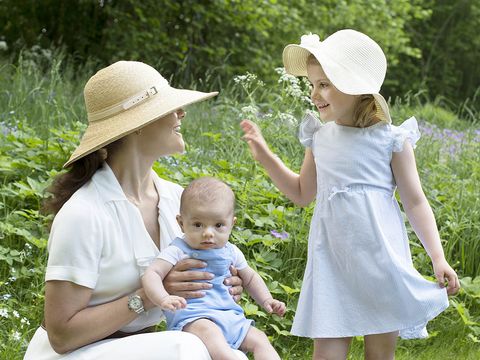 Clothing, Arm, Hat, People, Child, Hand, People in nature, Summer, Baby & toddler clothing, Dress, 