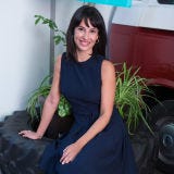 Clothing, Human, Finger, Hairstyle, Shoulder, Photograph, Joint, Dress, Facial expression, Sitting, 